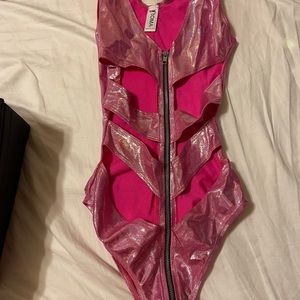 One piece from rave wonderland. Never been worn.